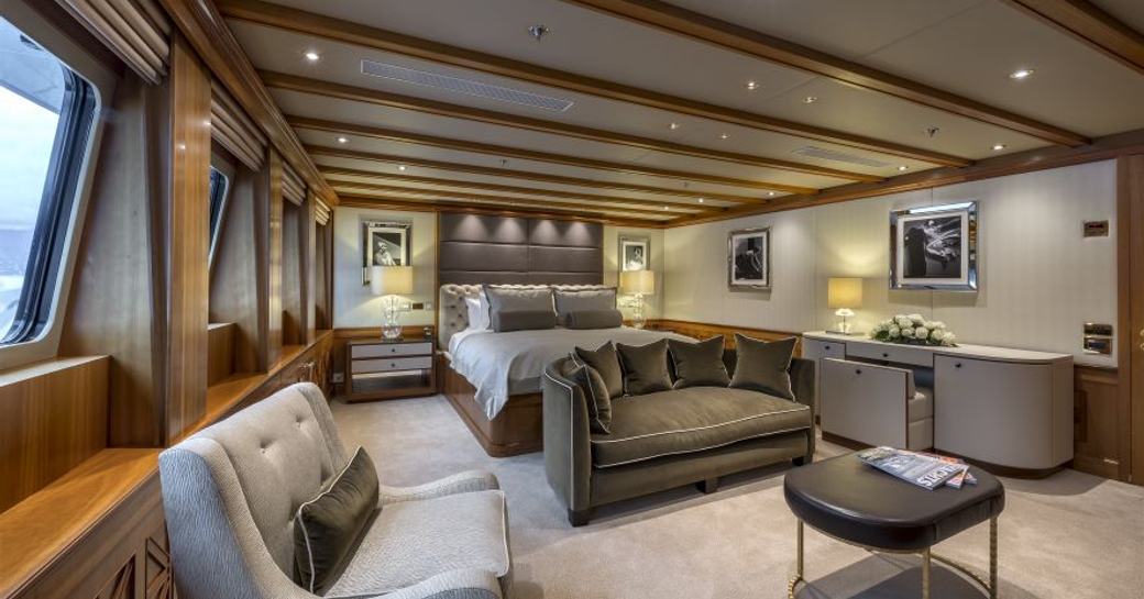 the master cabin in charter yacht the wellington is sleek and stylish with muted interior design that is classic and luxurios 