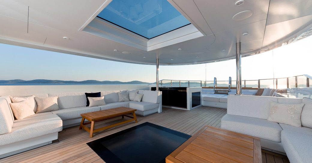 Sundeck with lounging area, jacuzzi and skylight on board superyacht SAMURAI