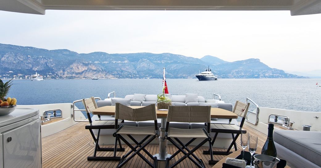 alfresco dining and lounging on aft deck of motor yacht NAMI