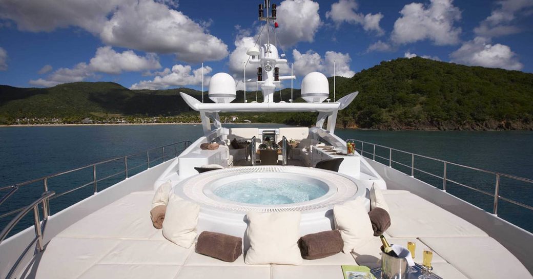 sun pads and jacuzzi on sundeck of motor yacht destiny