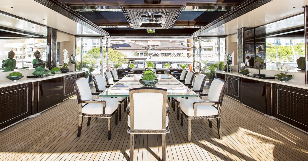 Al fresco dining on charter yacht Illusion V