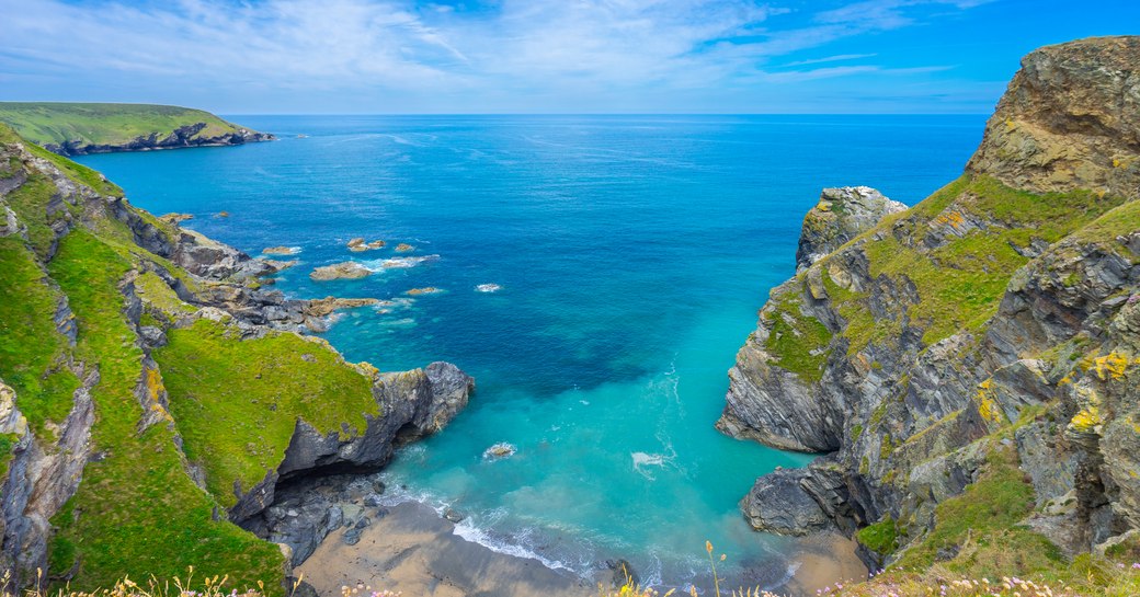 Hills and beautiful turquoise water on the Devon coast, UK