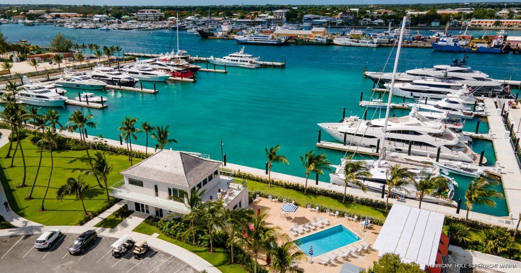 Overview of Hurricane Hole Superyacht Marina, with many charter yachts berthed
