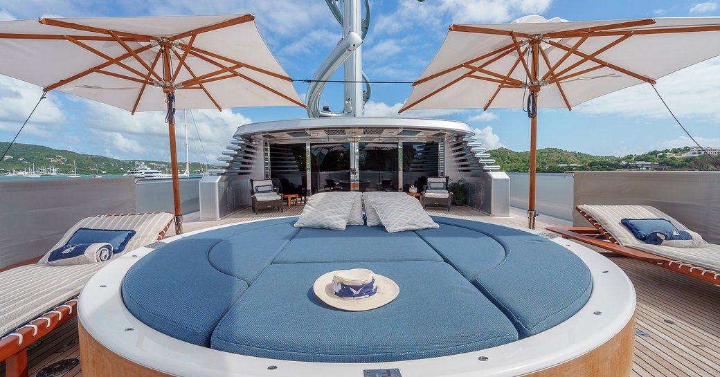 Large circular sunpad onboard sailing yacht charter MALTESE FALCON