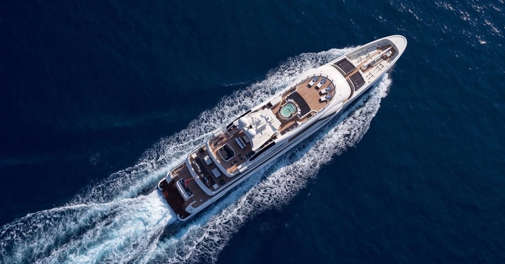 superyacht Elixir cuts through the water on a Mediterranean yacht charter
