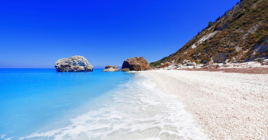 visit amazing beaches in mykonos on a luxury yacht charter in the cyclades