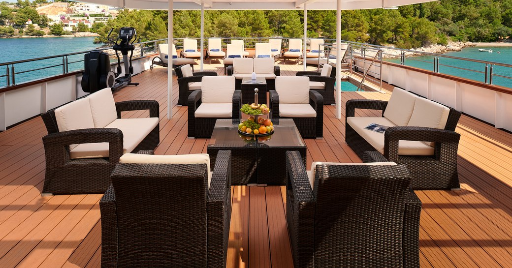 Exterior lounge area onboard private yacht charter QUEEN ELEGANZA