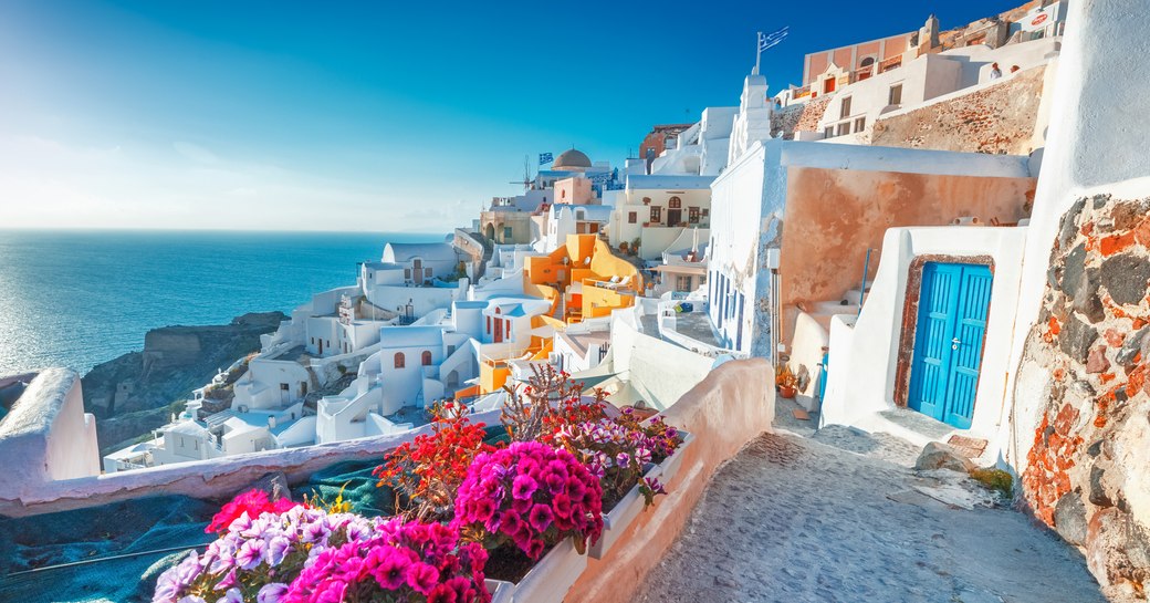 Beautiful island of Greece, with flowers and cobbled streets