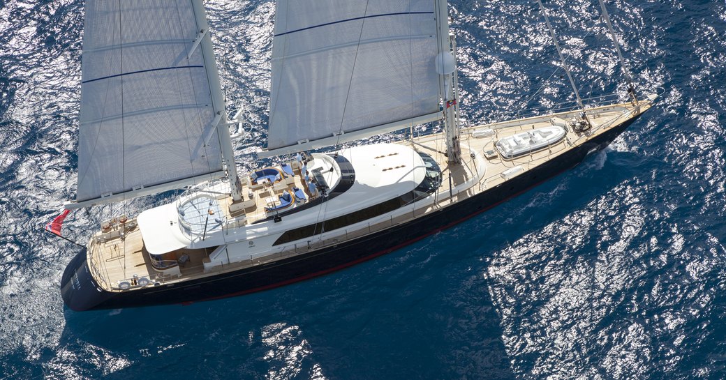 Aerial view looking down on sailing charter yacht VICTORIA A, surrounded by sea