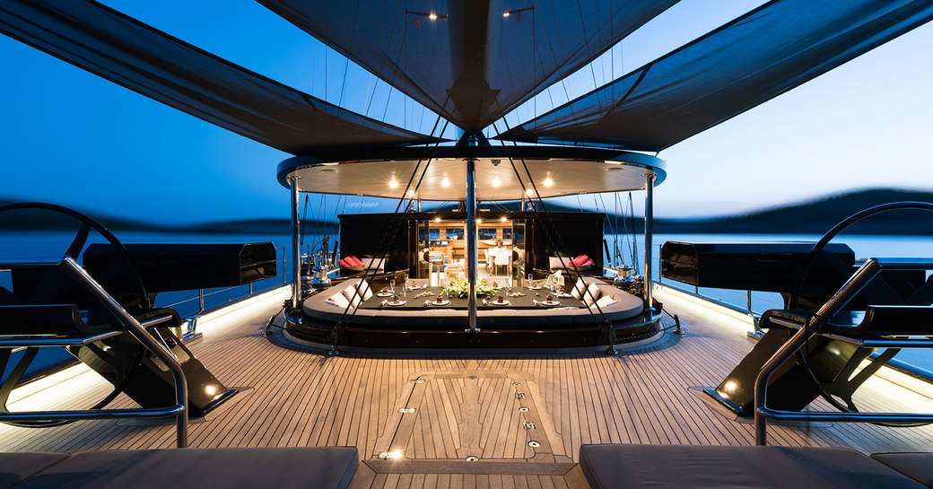 Alfresco dining area on aft main deck of luxury yacht Rox Star 