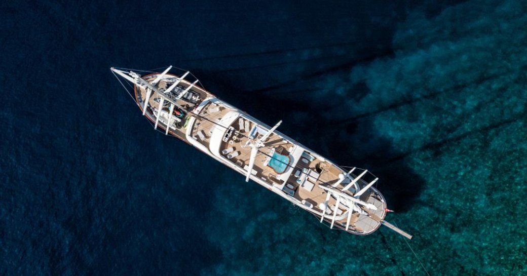 superyacht MEIRA's sundeck and sails captured while on a Mediterranean yacht charter