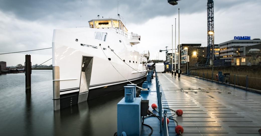 charter yacht Game Changer anchored outside Damen shipyard in the Netherlands