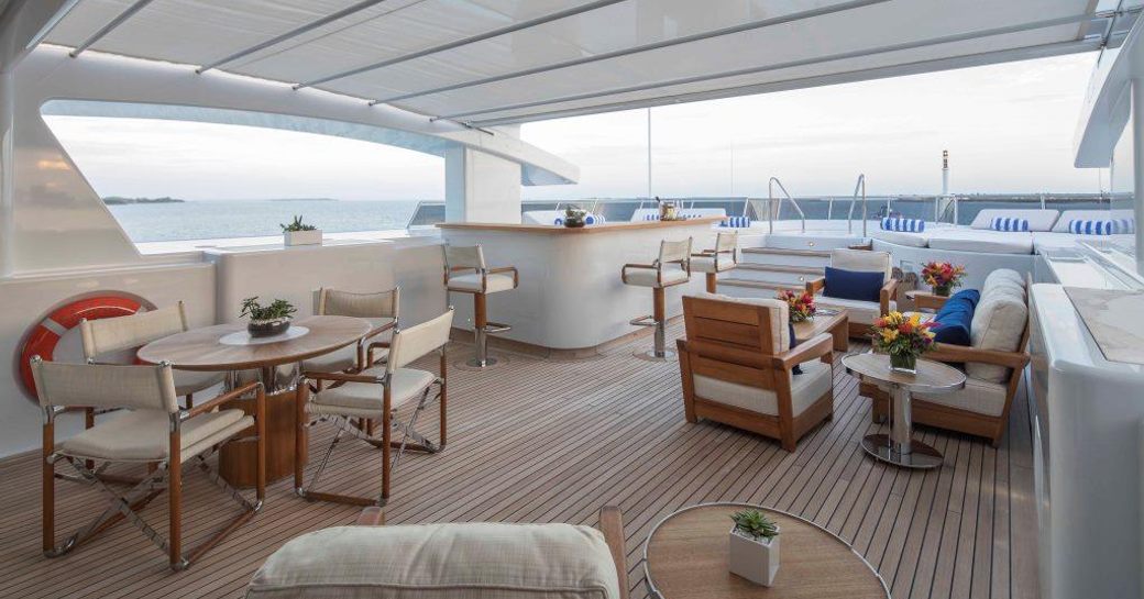 bar and seating areas on the sundeck of motor yacht SAMADHI 