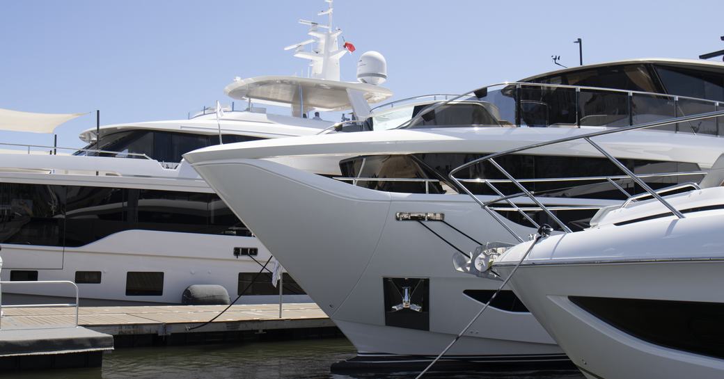 A line of motor yacht charters berthed at the Palm Beach International Boat Show
