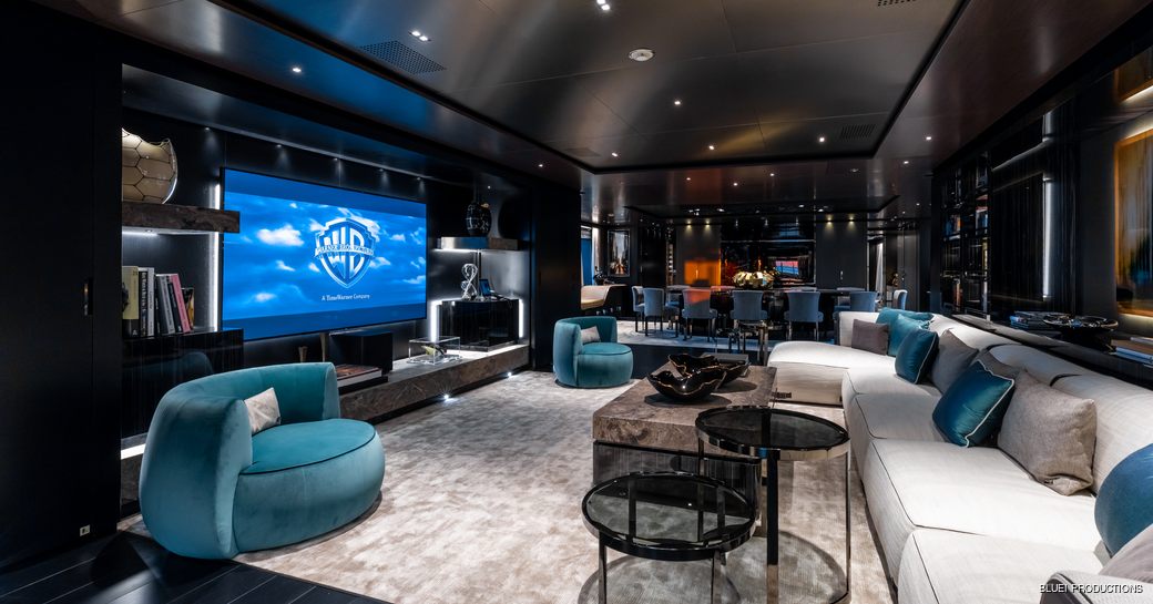 sumptuous main salon with seating area and huge TV on board motor yacht SOLO