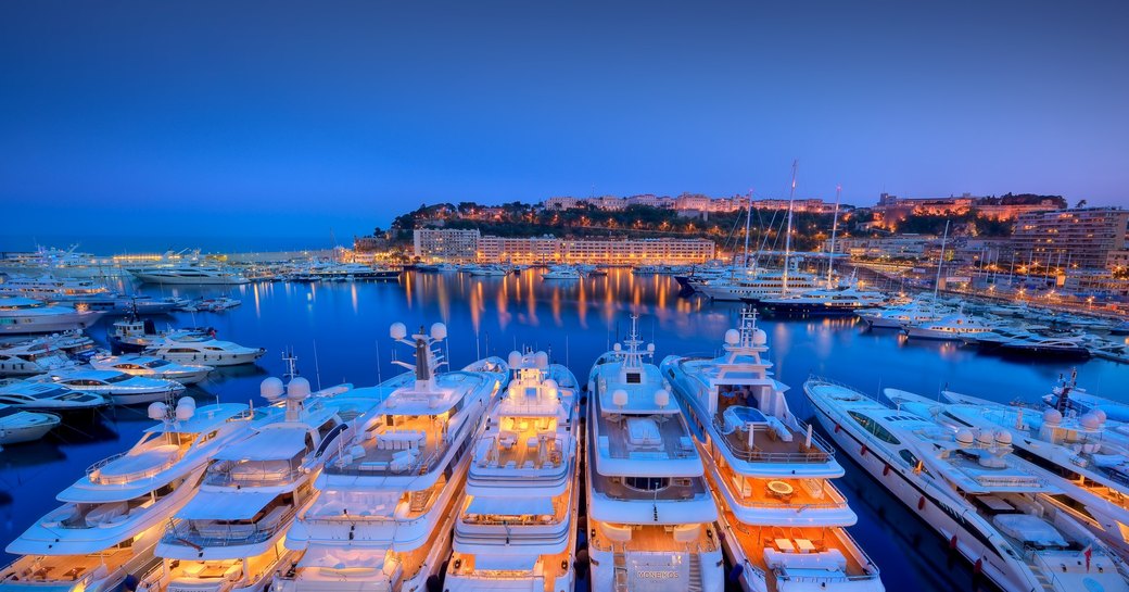 Superyachts at anchor in the French Riviera at night