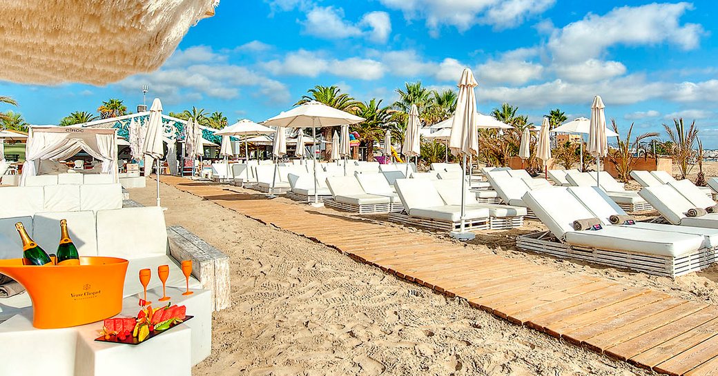 sun loungers lined up at Ushuaïa Beach Club, Ibiza