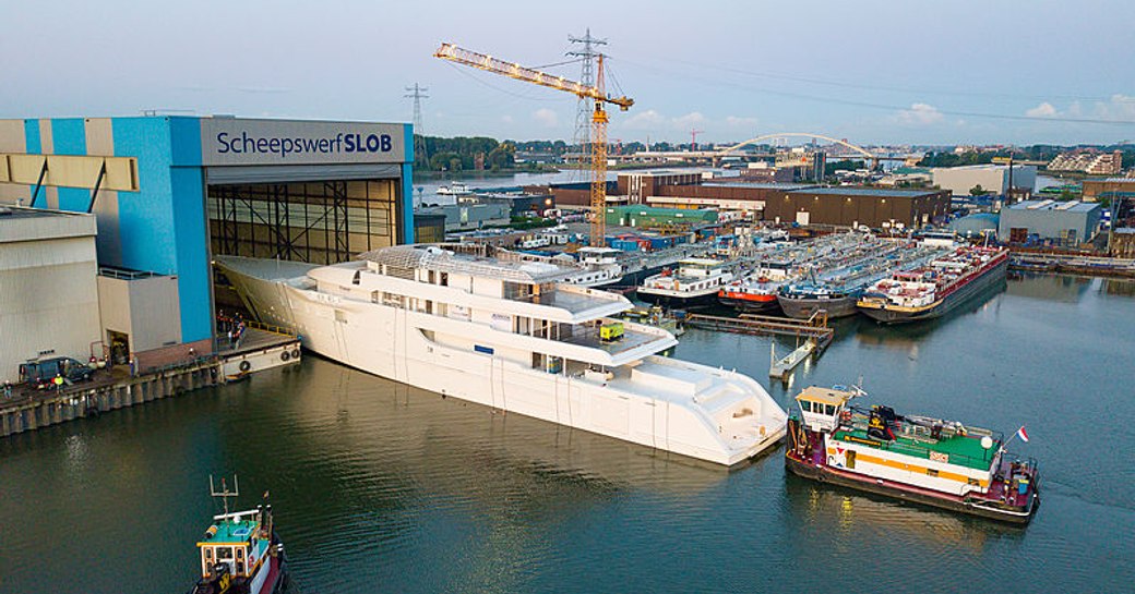 Feadship luxury yacht 1009 leaving yard in Netherlands