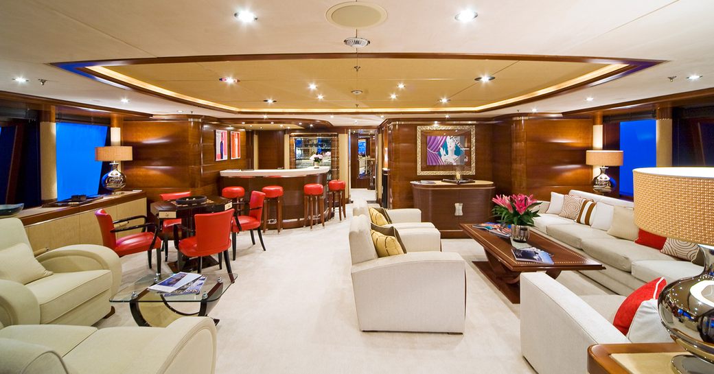 Bar and seating area on board superyacht LATITUDE