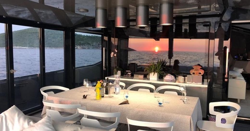 Main salon dining set-up on luxury yacht Joy Star