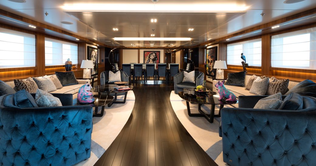sensuous main salon on board superyacht RARITY with sofas and armchairs