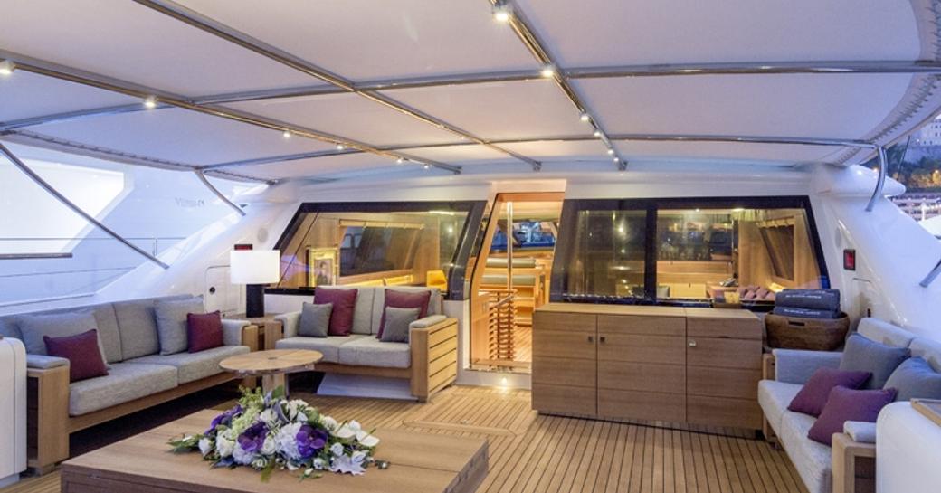 luxurious Bimini-covered cockpit with seating aboard superyacht ‘State of Grace’ 