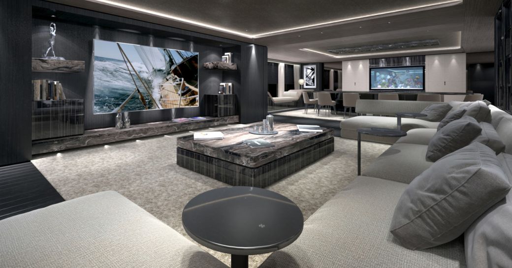 plush main salon with huge sofa and TV screen on board luxury yacht SOLO 