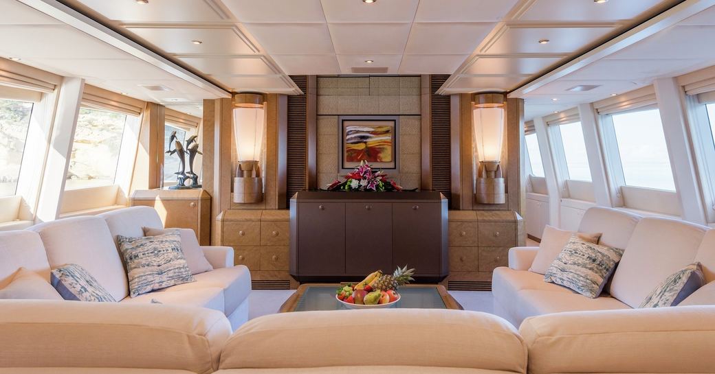 elegant main salon with sumptuous lounge on board charter yacht Benita Blue 