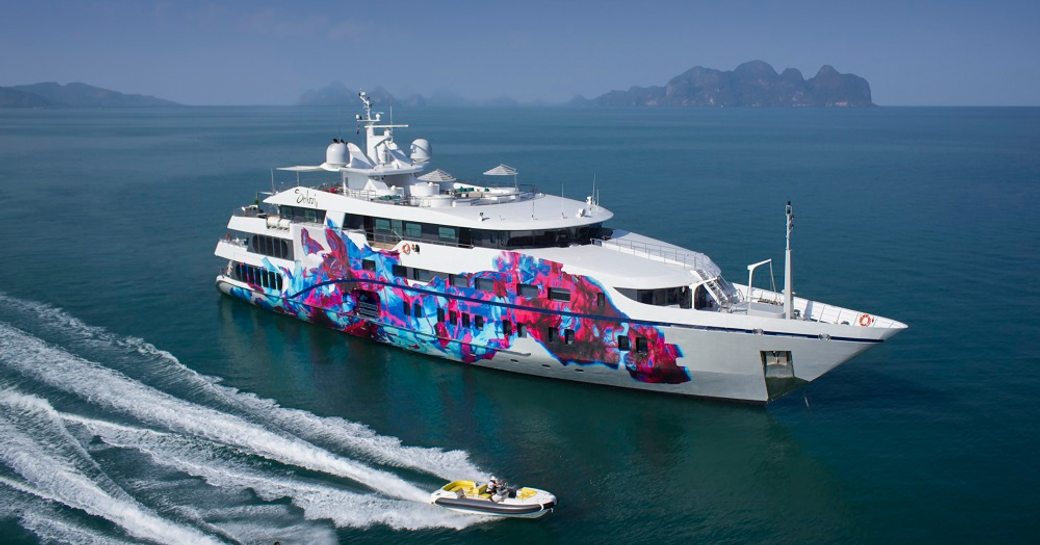 superyacht SALUZI anchors alongside her tender and water toys