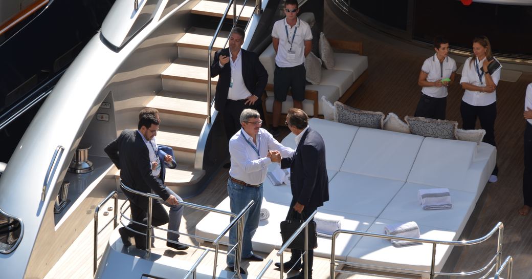 Business meeting taking place on yacht at Monaco Yacht Show