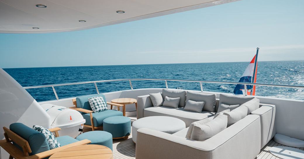 Comfortable seating area on deck of explorer yacht SEAL