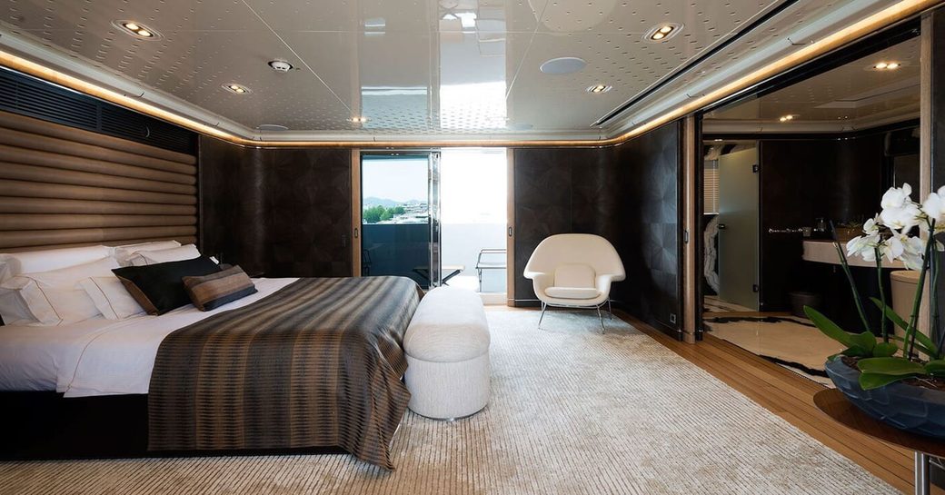 Master cabin with fold-down balcony on board charter yacht AQUARIUS