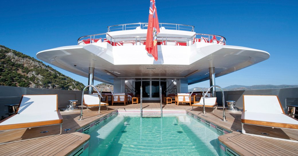 Aft deck swimming pool onboard charter yacht AXIOMA