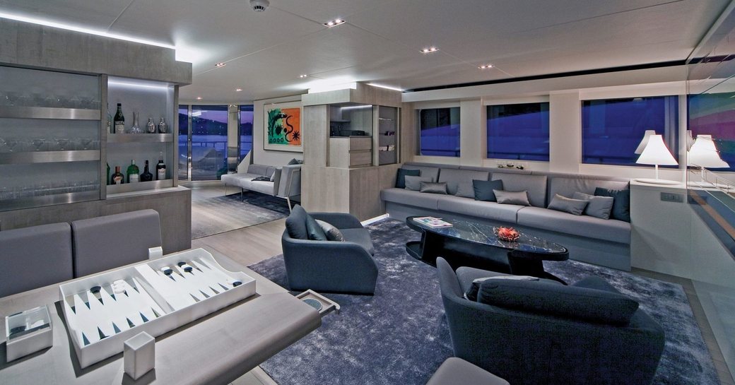 comfortable seating areas in the main salon aboard charter yacht JEMS