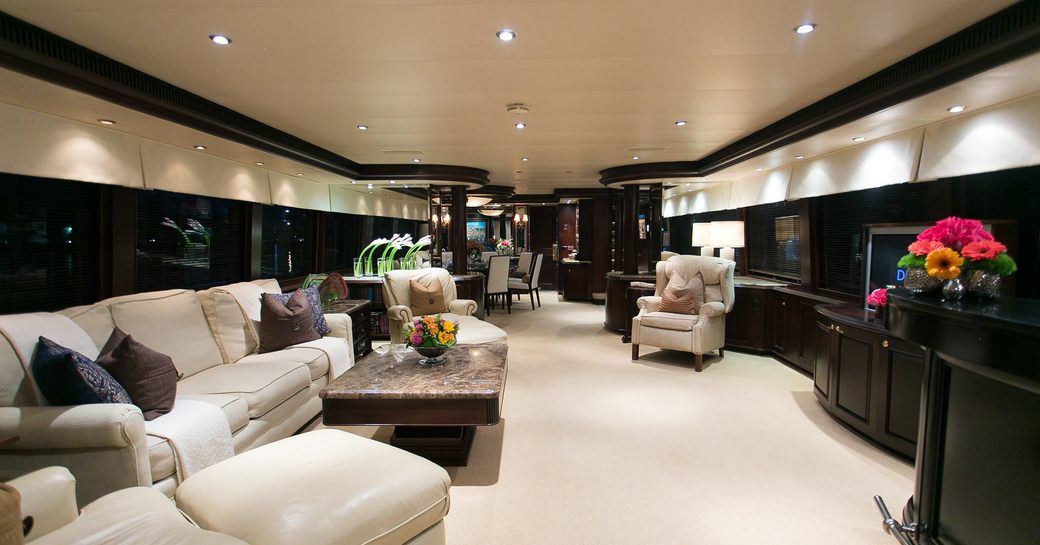mahogany main salon with lounge on board motor yacht ‘Sea Dreams’ 