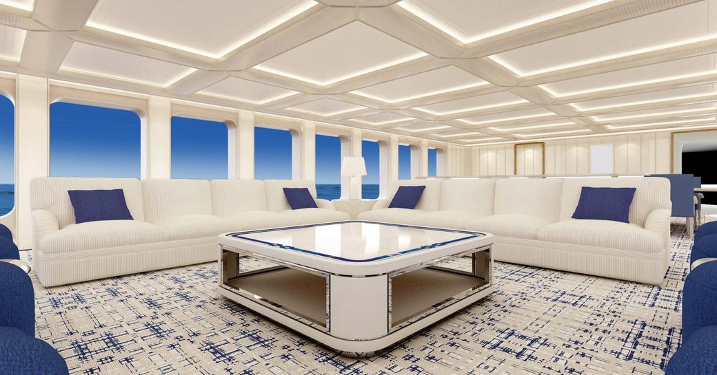 main salon with large white sofas on board superyacht AQUARIUS 