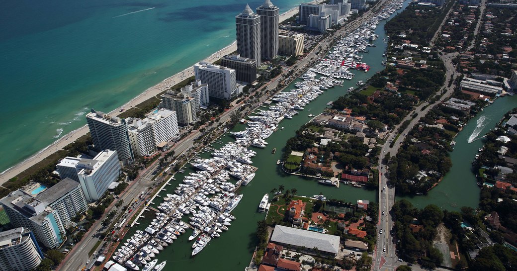 Yachts lined up along Collins Avenue in Miami for the Miami Yacht Show