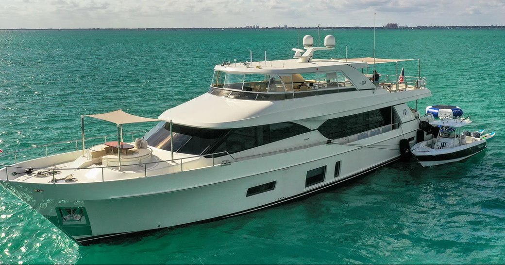 Motor yacht ENTREPRENEUR with smaller boat by side