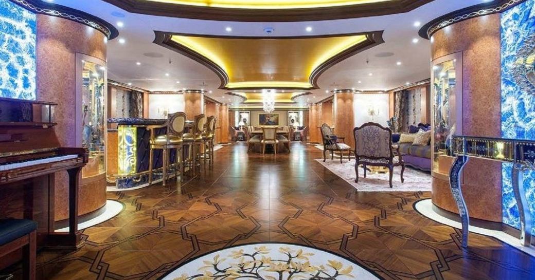 Ornate main salon on board charter yacht Solandge