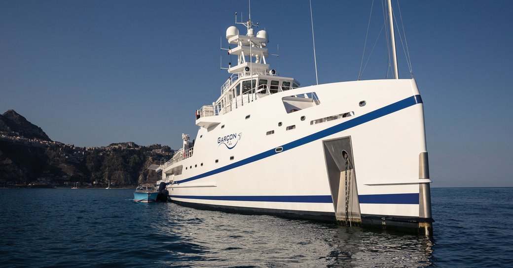 charter support vessel cruising open waters