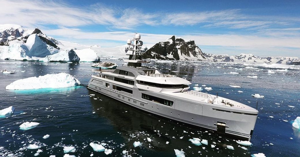 A superyacht traverses the icy waters of Antarctica