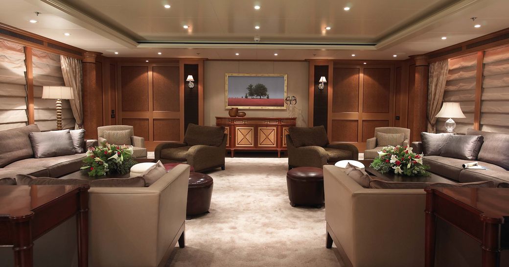 elegant main salon with seating areas aboard superyacht UTOPIA 