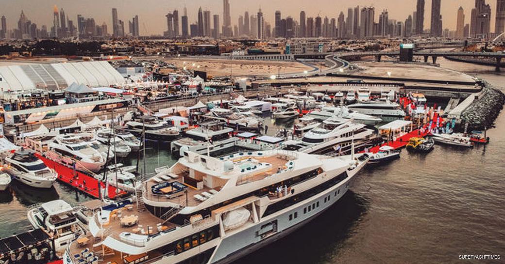 yachts line up for the Dubai Boat Show on Dubai Canal 