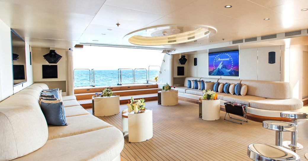 chic beach club with bar and lounge area on board charter yacht ‘Moonlight II’ 