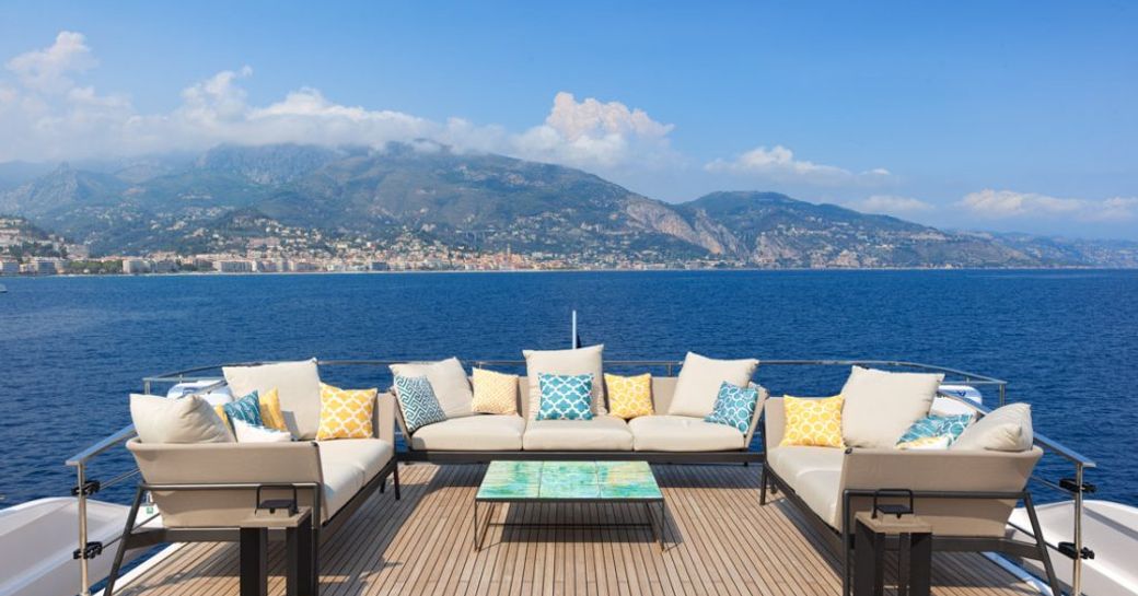 outdoor seating and amazing mediterranean views from the luxury yacht charter vessel h&co