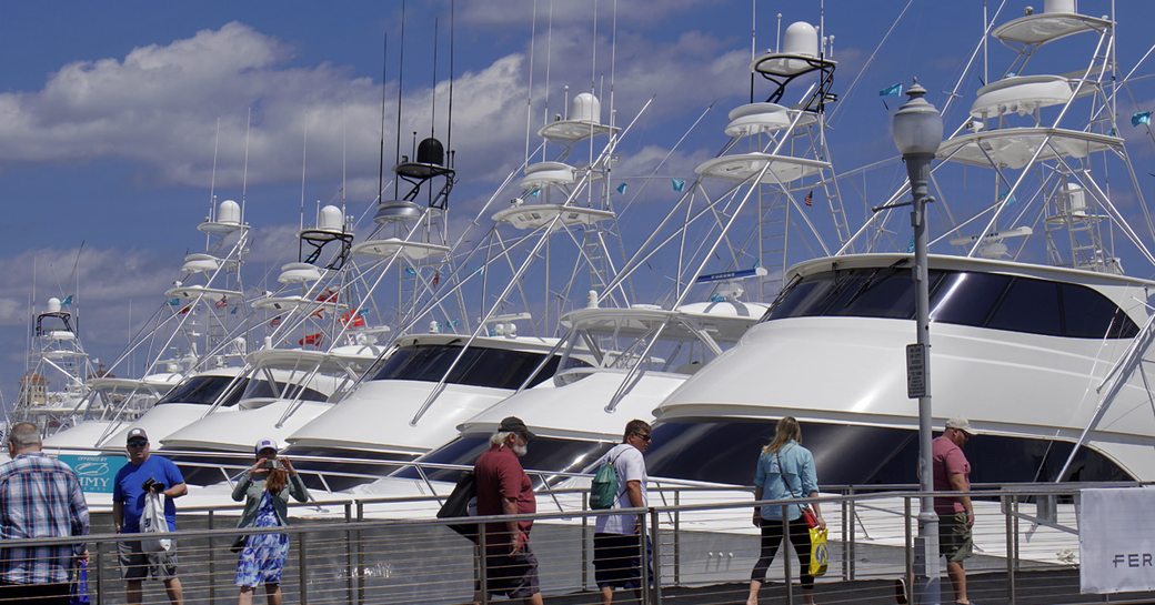 Line of motor yachts moored at Palm Beach International Boat Show