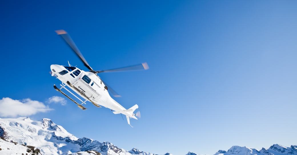 Helicopter exploring Antarctica coast