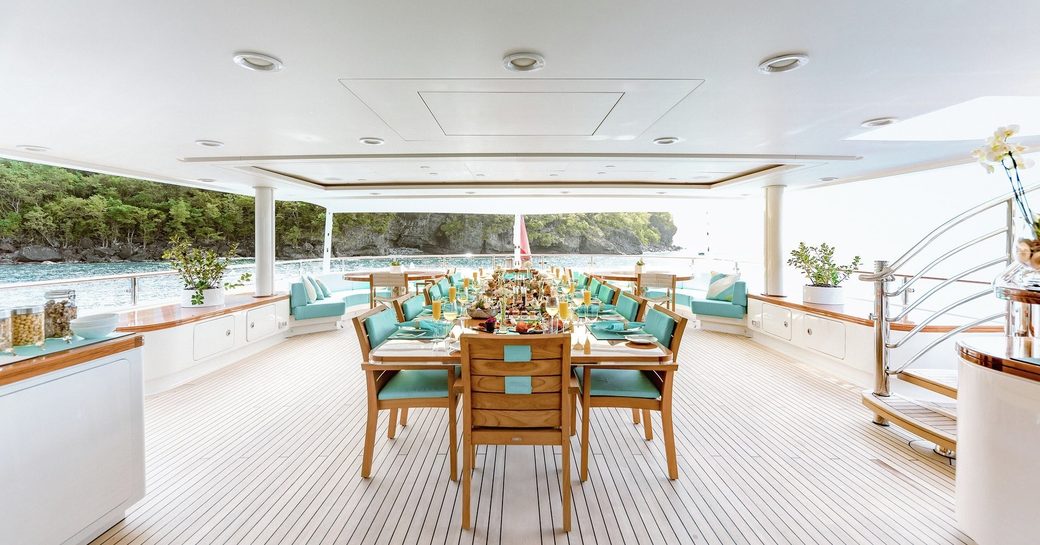 Alfresco dining area on luxury yacht Ramble on Rose