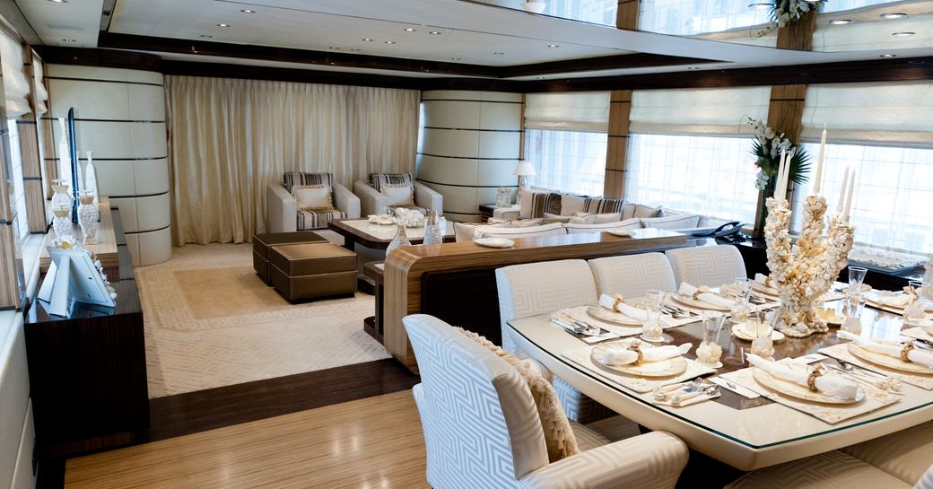 classically styled main salon with lounge and dining area on board superyacht ‘I Sea’ 