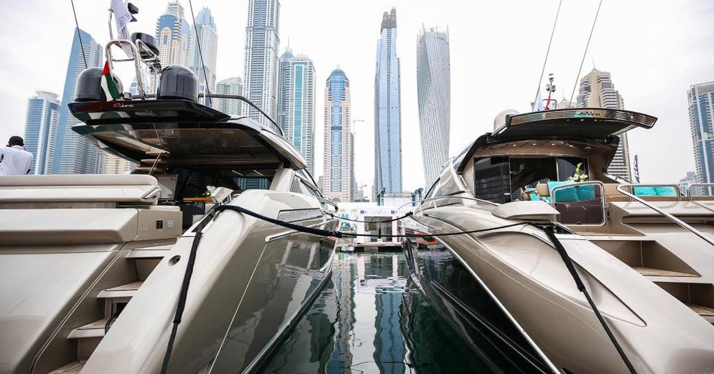 An aft view of two superyachts at the Dubai International Boat Show 2018